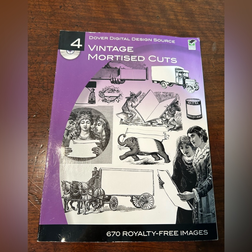 Vintage Mortised Cuts Book And CD. 
670 Royalty Free Graphic Images